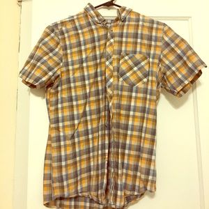 Short-sleeved orange and blue plaid button down